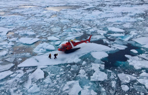 A helicopter from the Swedish icebreaker Oden lands on an ice floe to pick up crew members involved in the retrieval of a scientific acoustic recorder containing valuable data on Arctic marine life movements in the Canadian Arctic July 25, 2019 in this picture obtained from social media. Inner Space Center via REUTERS ATTENTION EDITORS - THIS IMAGE HAS BEEN SUPPLIED BY A THIRD PARTY. MANDATORY CREDIT. NO RESALES. NO ARCHIVES. - RC18C2FD9E10